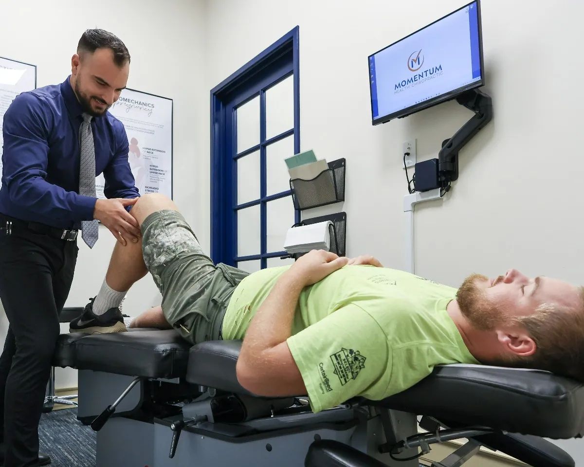 Chiropractic examination for leg pain and joint mobility in San Luis Obispo, CA