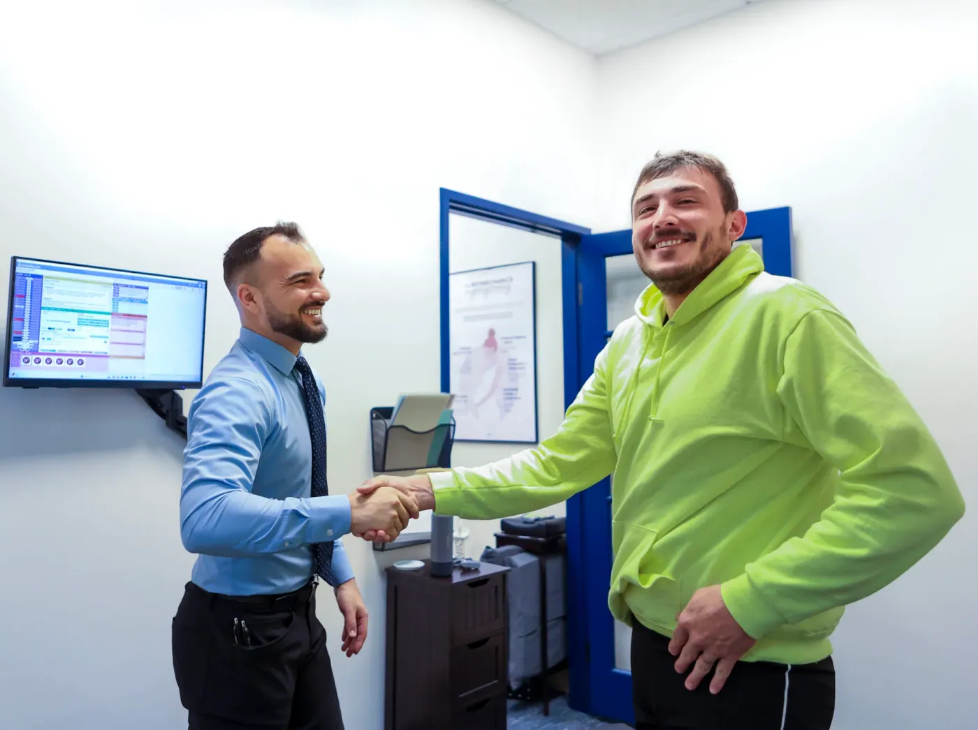 Dr. David Sedghi working with patient