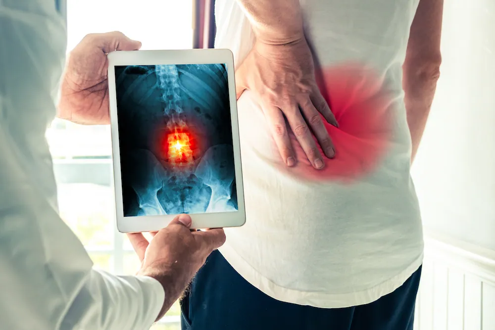 doctor showing patient digital xray result