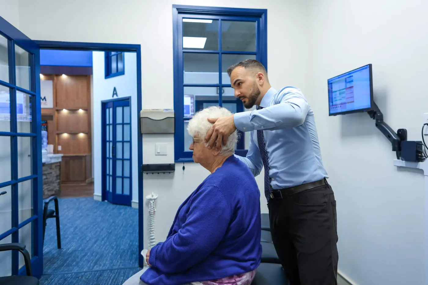 Dr. David Sedghi giving patient brain balance treatment
