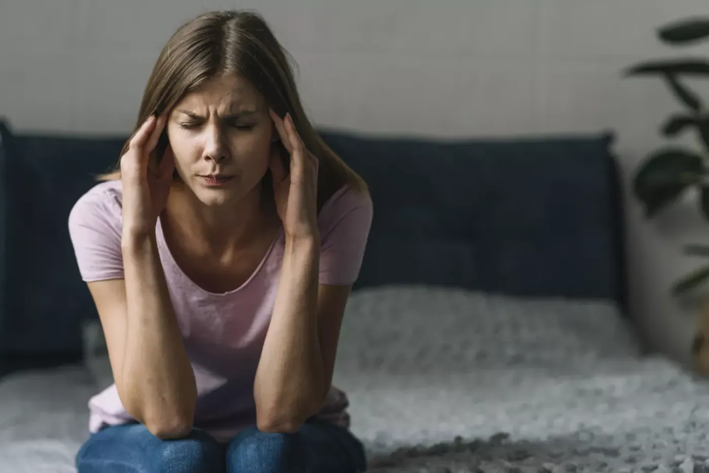 woman suffering from heaedache