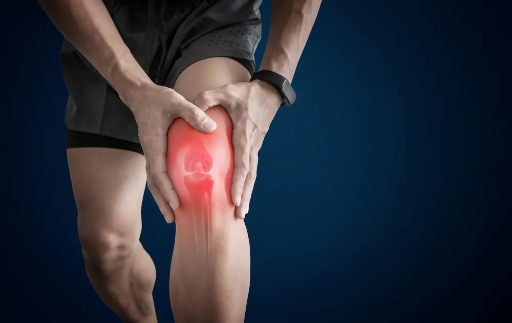 man suffering from overuse injury pain